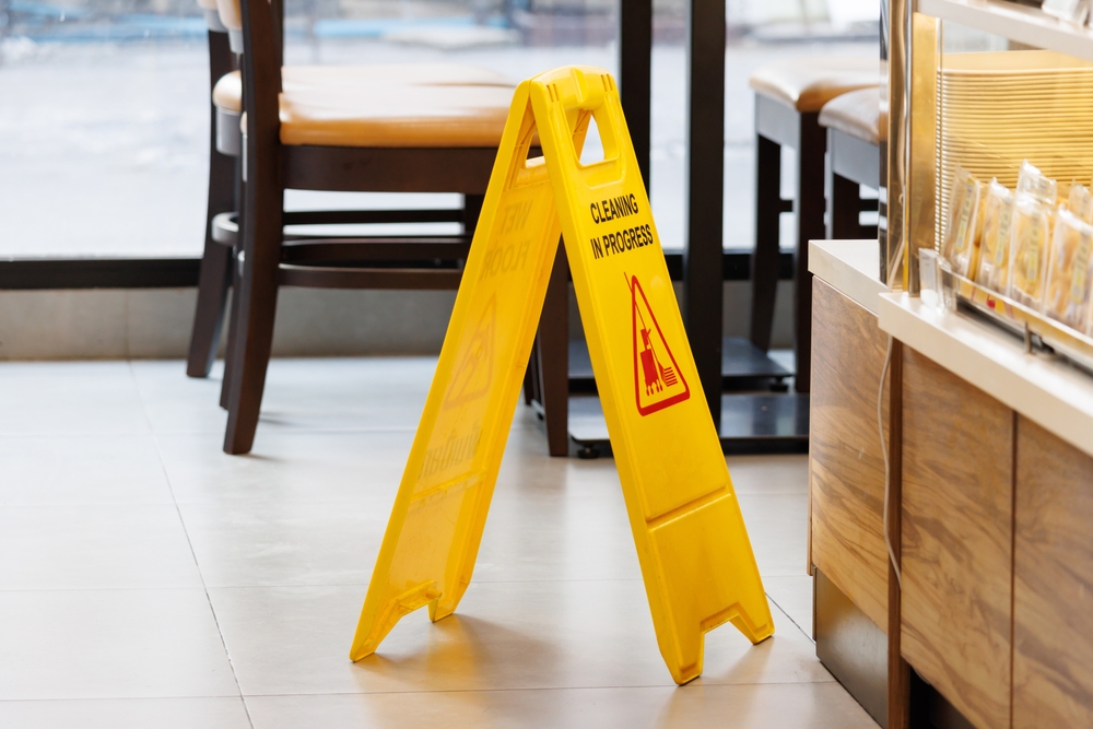 Caution sign in Florida restaurant to prevent slip and fall