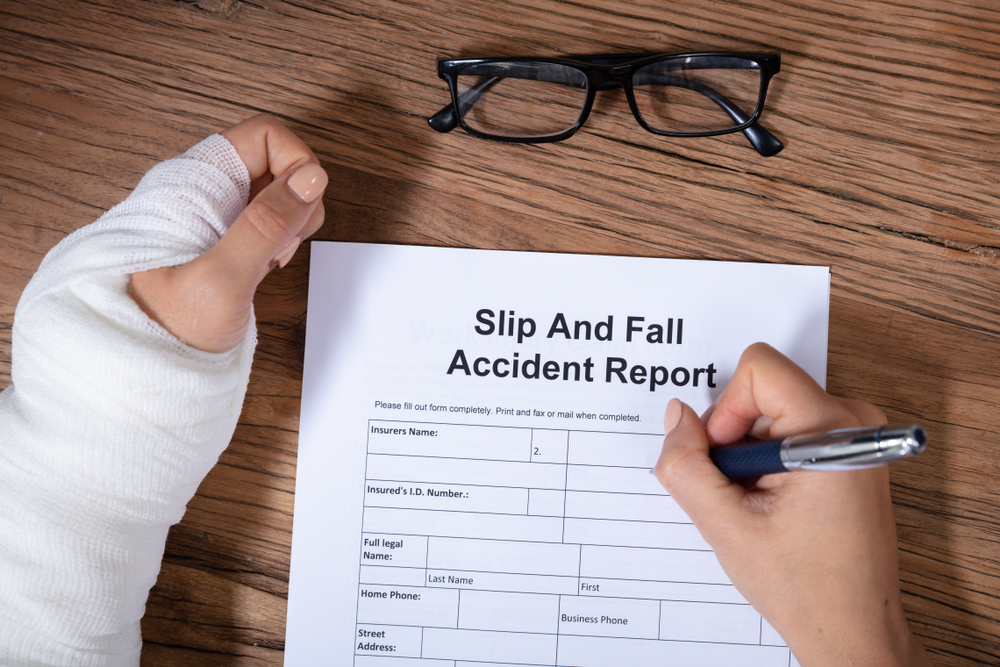 Slip and fall victim completing accident report