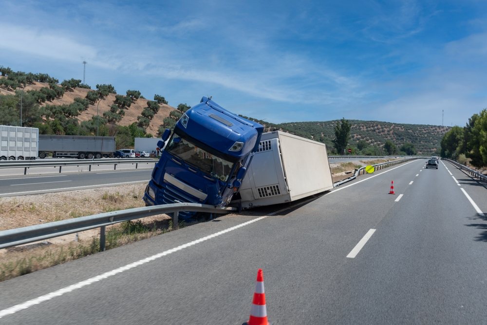 semi truck on the side of the highway involved in wreck