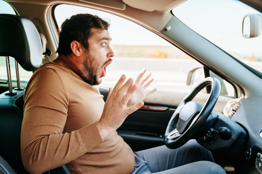 man who is shocked after getting rear ended in FL